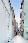 Europe, Croatia, Dalmatia, Zadar, a nun walking along a street in the historic centre of town