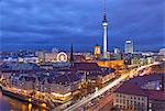 Berlin Mitte, the central distric of Berlin with the 368m tall TV tower seen from Fischerinsel at dusk.