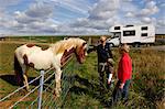 Family in front of their motorhome, Laugarvatn, Iceland MR