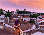 Portugal, Estramadura,Obidos, overview of 12th century town at dusk
