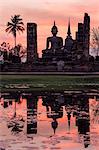 Thailand, Sukhothai Historical Park. Wat Mahathat temple at sunset