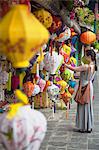 Woman looking at lanterns, Hoi An (UNESCO World Heritage Site), Quang Ham, Vietnam (MR)