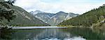 Scenic view of mountains and a clear lake (Plansee) in autumn, Tirol, Austria