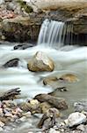 Close-up scene of flowing water and rocks in the Partnach Gorge in autumn, Upper Bavaria, Germany