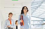 Businesswomen walking at office