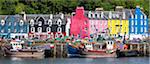 Multi-coloured buildings on the waterfront of Sound of Mull at Tobermory, Isle of Mull, Inner Hebrides, Scotland, United Kingdom, Europe