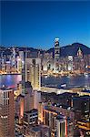 View of Hong Kong Island and Tsim Sha Tsui skylines at dusk, Hong Kong, China, Asia