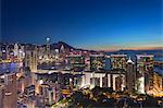 View of Hong Kong Island and Tsim Sha Tsui skylines at dusk, Hong Kong, China, Asia