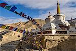 Prayer flags and stupa at the monastery at Lamayuru, Ladakh, Himalayas, India, Asia