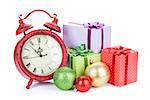 Christmas clock, gift boxes and bauble decor. Isolated on white background