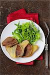 gourmet salad with grilled beef tongue and pear