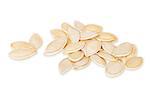 Pumpkin seeds on the white background