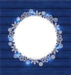 Illustration Christmas round frame made in snowflakes on blue wooden background - vector