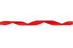 Valentines day spiral shaped red ribbon. Isolated on white background with copy space