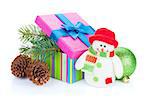 Christmas gift box, decor and snowman toy. Isolated on white background