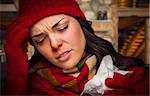 Bundled Up Sick Woman Inside Cabin With Tissue.