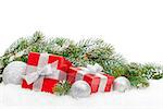 Christmas gift boxes and snow fir tree. Isolated on white background with copy space