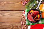 Christmas mulled wine on wooden table. View from above with copy space