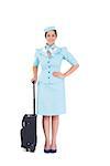 Pretty air hostess holding suitcase on white background