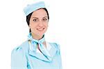 Pretty air hostess smiling at camera on white background