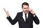 Angry businessman gesturing on the phone on white background