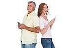 Casual couple sending text messages on white background