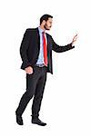 Businessman walking and presenting with hands on white background