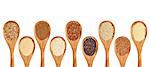 a variety of gluten free grains (buckwheat, amaranth, brown rice, millet, sorghum, teff, black, red and white quinoa) on wooden spoons isolated on white