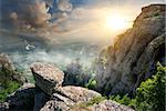 Big birds and majestic rocks at the sunset