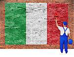 House painter paints flag of Italy on old brick wall