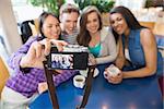 Young students taking a selfie at the university