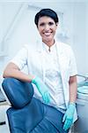 Portrait of happy confident female dentist