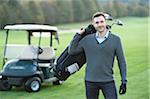 Portrait of Man Playing Golf on Golf Course in Autumn, Bavaria, Germany