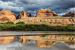 Sandstone rocks reflecting in the Colorado River, Canyonlands National Park, Utah, United States of America, North America