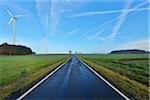 Country Road in Morning with Wind Turbines, Freiensteinau, Vogelsbergkreis, Hesse, Germany