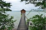 Boathouse with Wooden Jetty on Lake, Ammersee, Stegen am Ammersee, Funfseenland, Upper Bavaria, Bavaria, Germany