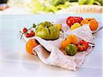 Fresh, Ripe Heirloom Tomatoes on Beige Cloth Outdoors, Canada