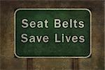 "Seat belts save lives" roadside sign illustration, with distressed ominous background