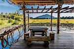 wooden table at terrace Angkor Cambodia