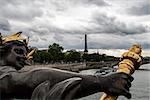 Statue in Alexander III bridge. Paris, France.