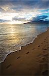 Sunset and Beach Footprints on Maui in Hawaii