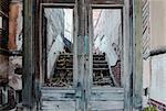 Broken wooden doors at abandoned building in Jerome Arizona