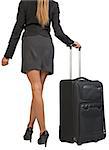 Cropped image of businesswoman with wheeled travel bag makes step forward, back view. Isolated over white background