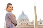 Portrait of happy young woman on piazza san pietro in vatican city state