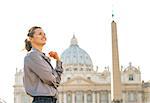 Portrait of young woman in front of basilica di san pietro in vatican city state