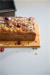 Closeup on freshly baked pumpkin bread with seeds on table