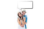 Happy hipster couple smiling at camera against speech bubble