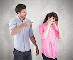 Man giving woman a headache against weathered surface