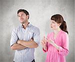 Woman arguing with uncaring man against weathered surface