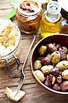 Italian antipasti: marinated olives, artichoke hearts and dried tomatoes